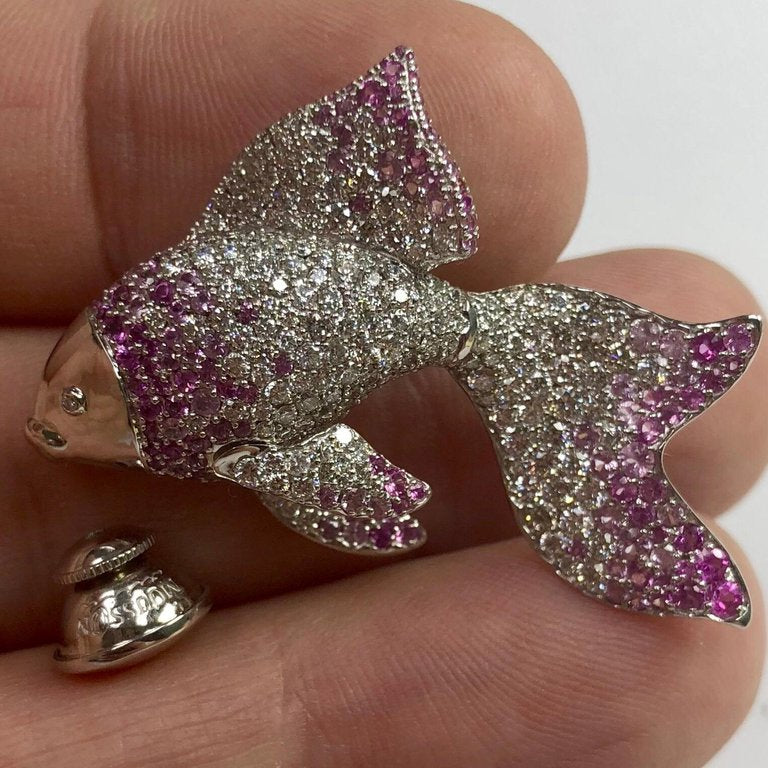 Brs 0251-21, 18K White Gold, Diamonds, Pink Sapphires Golden Fish Brooch